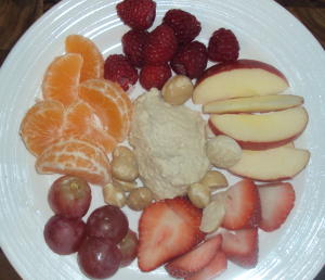 In the middle of the fruit are unprocessed raw macadamia nuts and cashew butter that I made for something else and had leftover